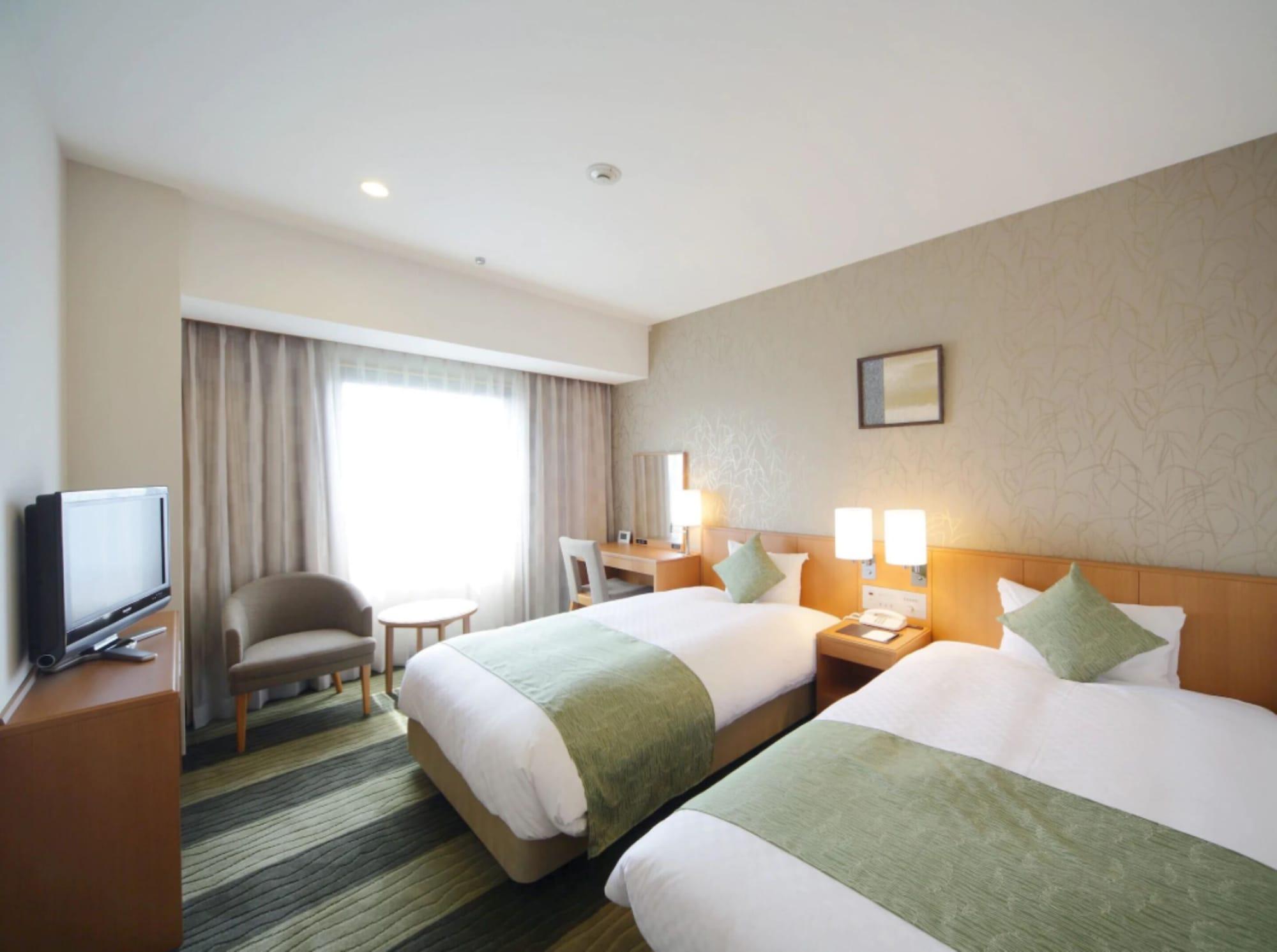 Hotel Granvia Wakayama Buitenkant foto A room at the hotel