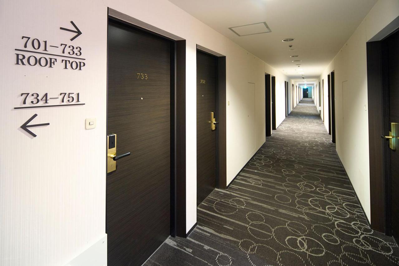 Hotel Granvia Wakayama Buitenkant foto A typical hotel corridor